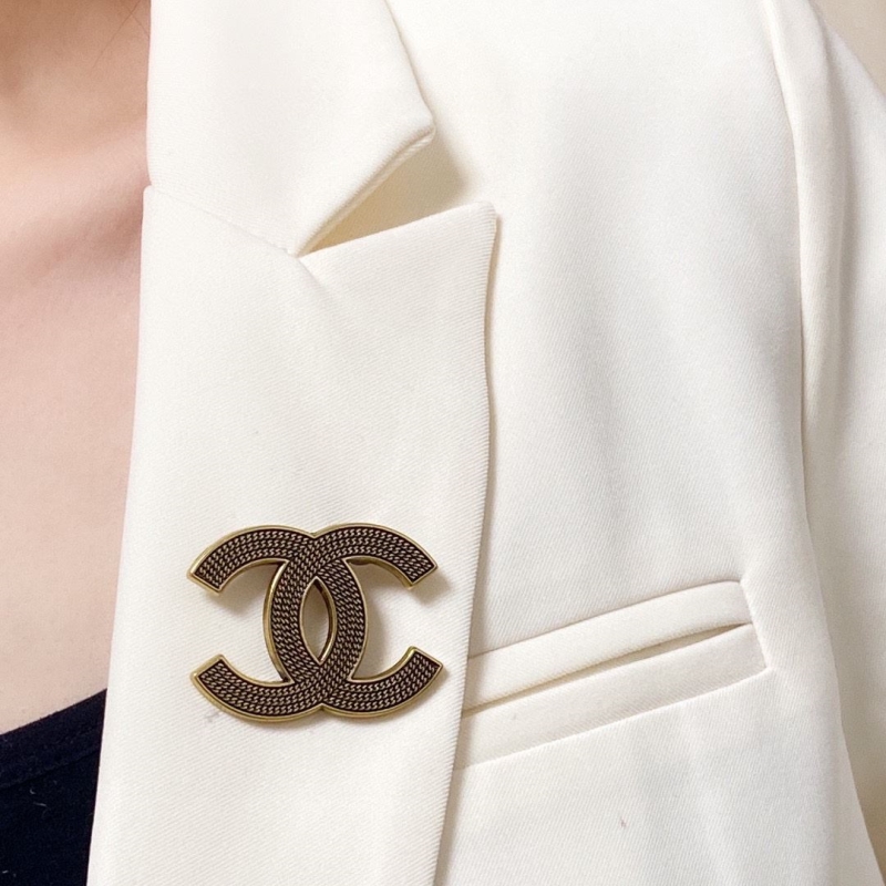 Ch**el brooches